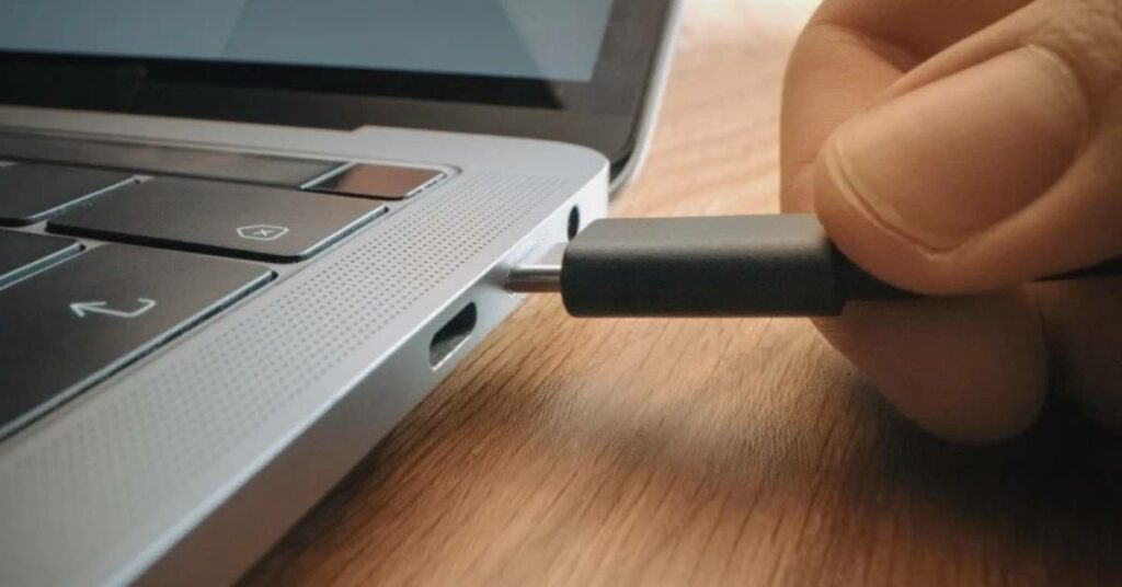 Do laptops stop charging when full